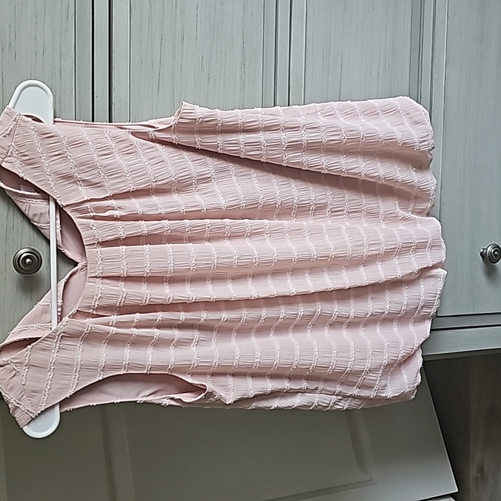 Pink blouse.